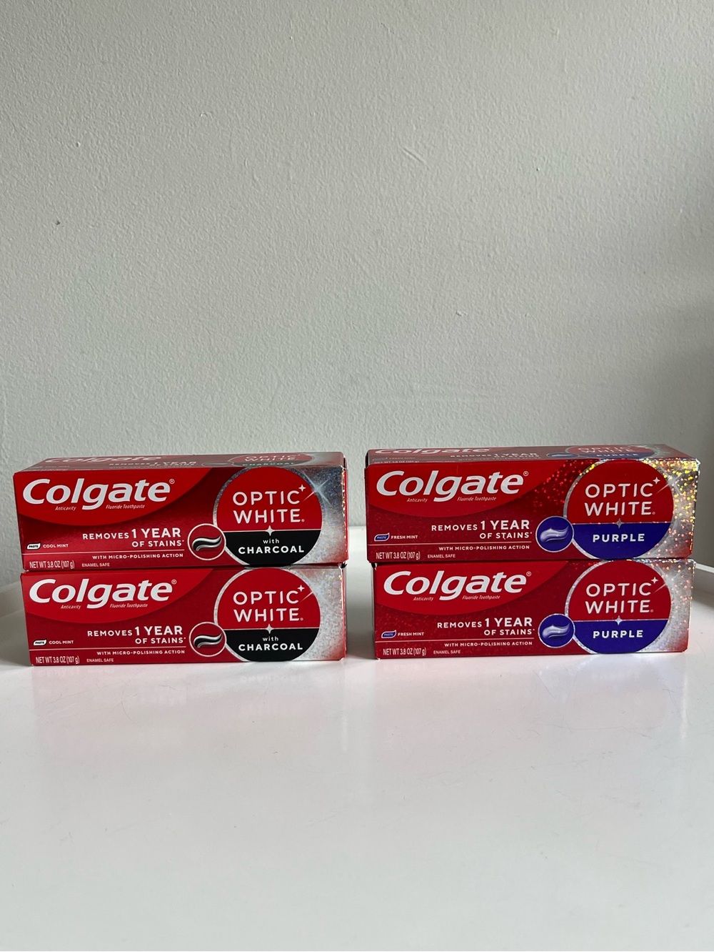 Lot of 4 COLGATE Optic White Toothpaste 2 Charcoal & 2 Purple New Sealed 2028